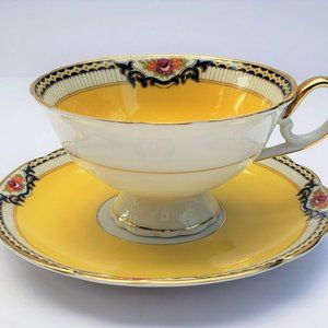 ROYAL BAYREUTH BRIGHT YELLOW TEACUP AND SAUCER